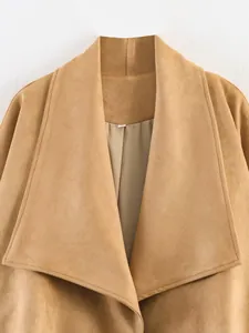 Close-up detail of a women's khaki suede jacket featuring a wide notched lapel design