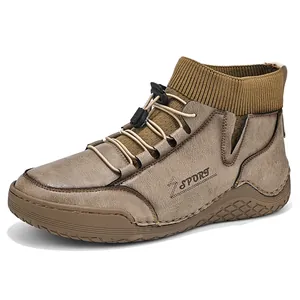 Men's vintage brown high-top Martin boots with elastic sock cuff and drawstring laces