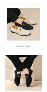Close-up detail of stylish men's British style suede loafers with gold horsebit buckle