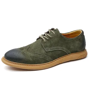 Vintage men's casual green suede brogue shoes with decorative perforation and tan sole