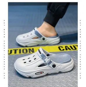Close-up of breathable men's clogs showing the lightweight hollow-out design and strap