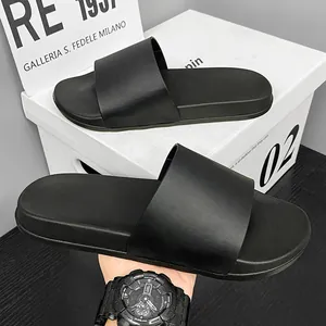 Claquettes noires minimalistes tendance pour hommes et femmes avec semelle souple