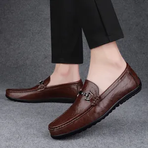 Classic brown leather loafers for men featuring elegant buckle and flexible soft sole