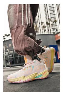 Detailed shot of mid-top colorblock basketball sneakers in an urban street setting
