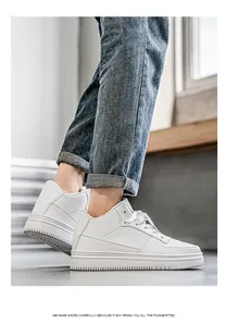 Detailed side view of stylish white high-top sneakers for men featuring a classic lace-up design