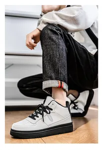 Detailed view of stylish white high-top sneakers for men with black accents