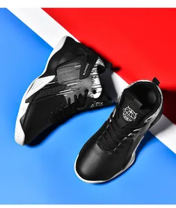 Close-up detail of black leather mid-top basketball shoes with fashion logo prints