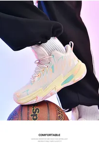 Detailed view of color-block mid-top basketball shoes for men on a basketball