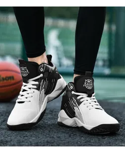 On-feet view of youth mid-top basketball shoes with durable leather and grippy soles