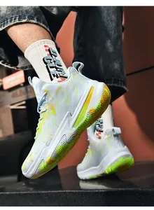 Professional dynamic shot of men's colorblock high-top basketball shoes in urban setting