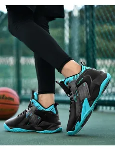 Detailed shot of black and cyan mid-top basketball shoes on a professional court setup