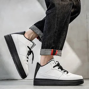 Fashionable white and black high-top board shoes for men with minimalist walking pose