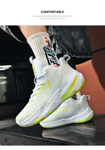 Close-up detail of men's color-block mid-top basketball shoes with a thick durable sole