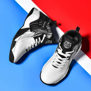 Youth leather mid-top basketball shoes in black and white with lace-up design