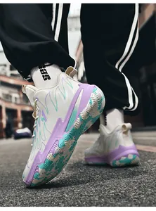 Action shot of mid-top color-block basketball shoes with thick wear-resistant soles
