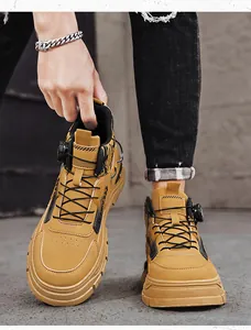 Detailansicht trendiger gelber Outdoor-Martin-Boots für Herren mit Schnellverschluss-Drehknopf