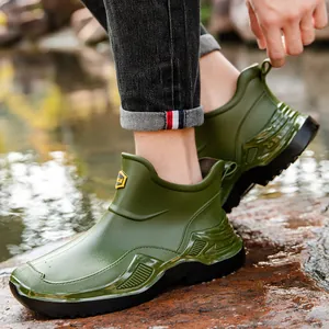 Stylish olive green men's waterproof short rain boots with thick platform sole for outdoor use
