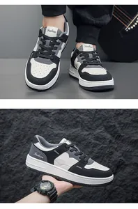 Gedetailleerd overzicht van stijlvolle zwart-grijze color-block low-top casual herensneakers