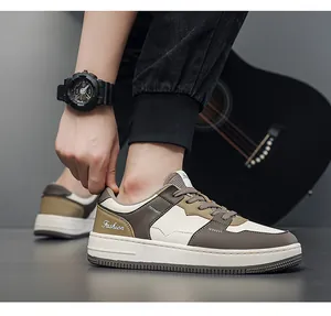 Detailweergave van casual lage leren sneakers met een modieus kleurblokontwerp