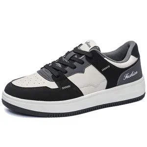Modieuze laag uitgesneden zwart-witte sneakers met vetersluiting en leren afwerking