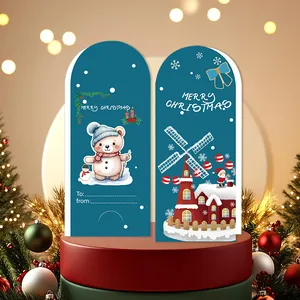 Vista detallada de tarjetas de felicitación navideñas con ilustraciones de osos y aldeas