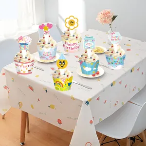 Detailed view of colorful Happy Birthday cupcake wrappers and toppers set