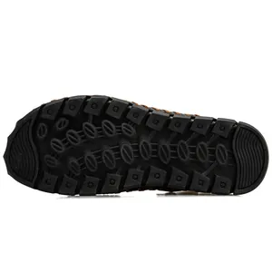 Durable anti-slip rubber sole detail of men's leather beach sandals with deep tread