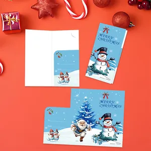 Festive blue Christmas cards with Santa and snowman illustrations on red background.