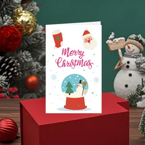 Vue détaillée d'une carte de Noël mignonne avec des illustrations festives et des vœux.