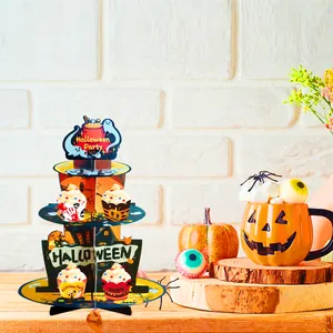 Three-tier Halloween themed cardboard cake stand with spooky ghost and pumpkin designs