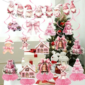 Festive pink Christmas party decorations including spiral hangings and paper honeycombs.