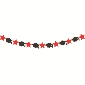 Graduation party banner decoration featuring glitter red stars and black doctoral caps