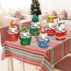 Festive Christmas cupcake wrappers and toppers featuring Santa and snowman designs