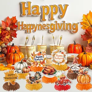 Autumn Thanksgiving party decoration paper honeycomb centerpieces with turkey and pumpkin designs.