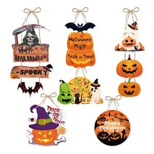 Detailed view of various Halloween hanging door signs with pumpkin and witch themes.