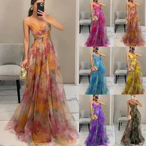 Vibrant mesh printed maxi dresses in seven color styles for summer vacation parties.