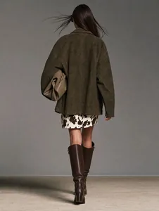 Back view of a stylish olive green suede long-sleeved jacket for autumn fashion trends.
