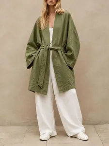Full-body view of a loose olive green linen-style belted cardigan jacket for women.