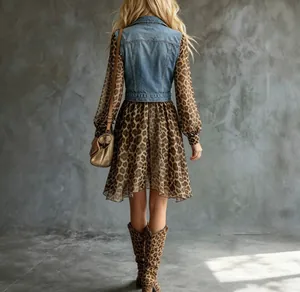 Back view of leopard print dress with denim vest outfit for women's fashion style
