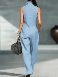 Rear view of a light blue sleeveless wide-leg jumpsuit in breathable cotton linen fabric.