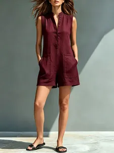 Detailed view of women's sleeveless cotton-linen romper in burgundy with stand collar