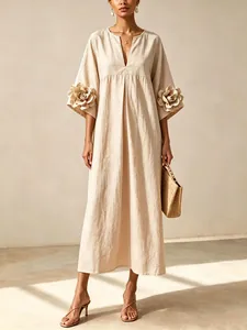 Elegant French style V-neck cotton linen maxi dress featuring bold 3D flower sleeves