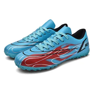 Chaussures de football pour hommes à motif flamme bleu et rouge pour terrain synthétique