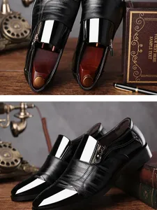 Close-up detail of black men's formal shoes with side zipper and textured leather finish