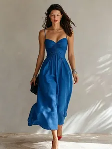 Elegant blue midi cami dress with ruched bodice and flowing skirt design