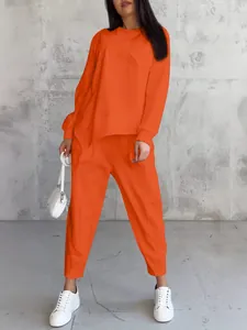 Casual vibrant orange round neck loose sweatshirt set with irregular hem for women