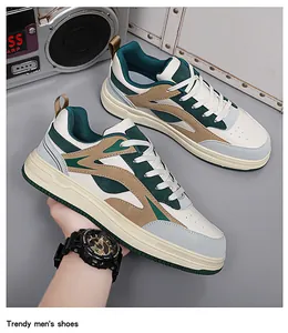 Detail shot of trendy thick-soled sneakers in green and khaki color blocking.