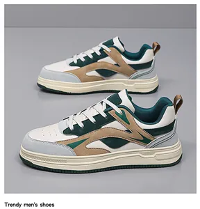 Detail view of stylish color-blocked men's platform sneakers with green and tan accents.