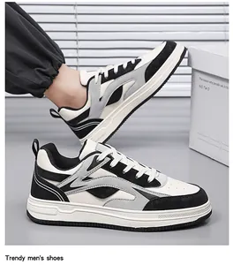 Detailed view of trendy men's low-top sneakers in stylish black and white color block