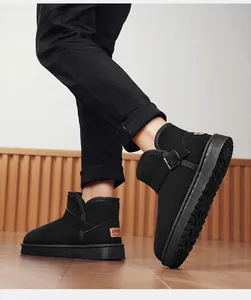 Detailed view of black fleece-lined snow boots featuring buckle and sport tag design.